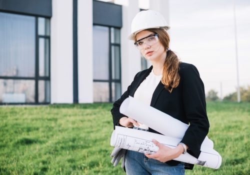 builder-woman-with-papers